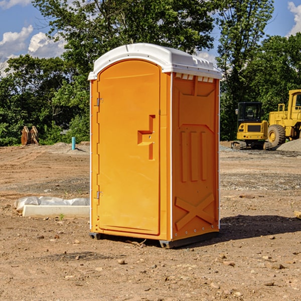 how often are the porta potties cleaned and serviced during a rental period in Middlesex